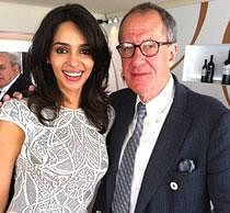 Bollywood actress Mallika Sherawat with Australian actor Geoffrey Rush at the Cannes Festival in Cannes on Sunday. PTI  Photo