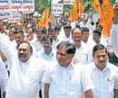 UP in arms: Karnataka BJP  president K S Eshwarappa leading a party protest rally against Governor H R Bhardwaj on M G Road in Bangalore on Monday. KPN