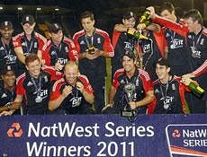 England's players celebrate after winning their series of One Day International cricket matches against India, at Sophia Gardens cricket ground in Cardiff, Wales, Friday, Sept. 16, 2011. (AP Photo)