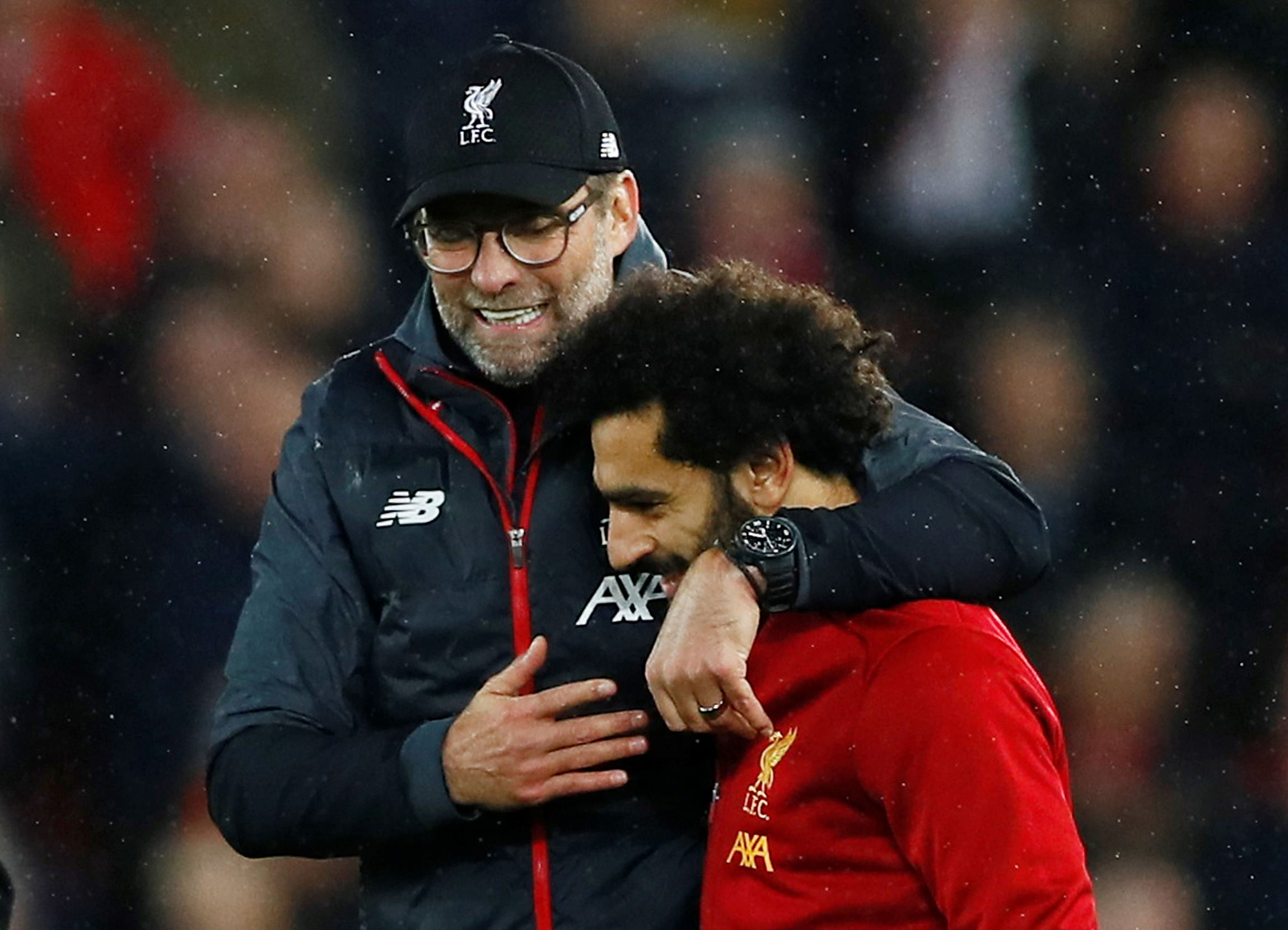 Liverpool's Mohamed Salah celebrates with manager Juergen Klopp after the match. (Reuters Photo)