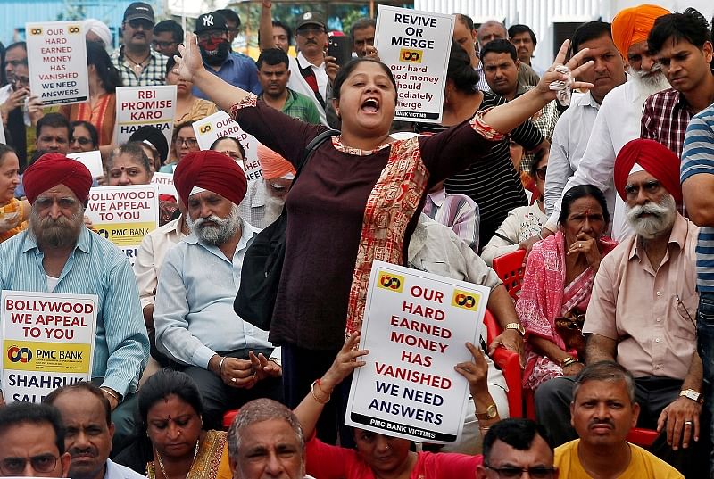 A depositor of the Punjab and Maharashtra Co-operative Bank (PMC) shouts slogans during a protest over the Reserve Bank of India (RBI) curbs on the bank. (PTI Photo)