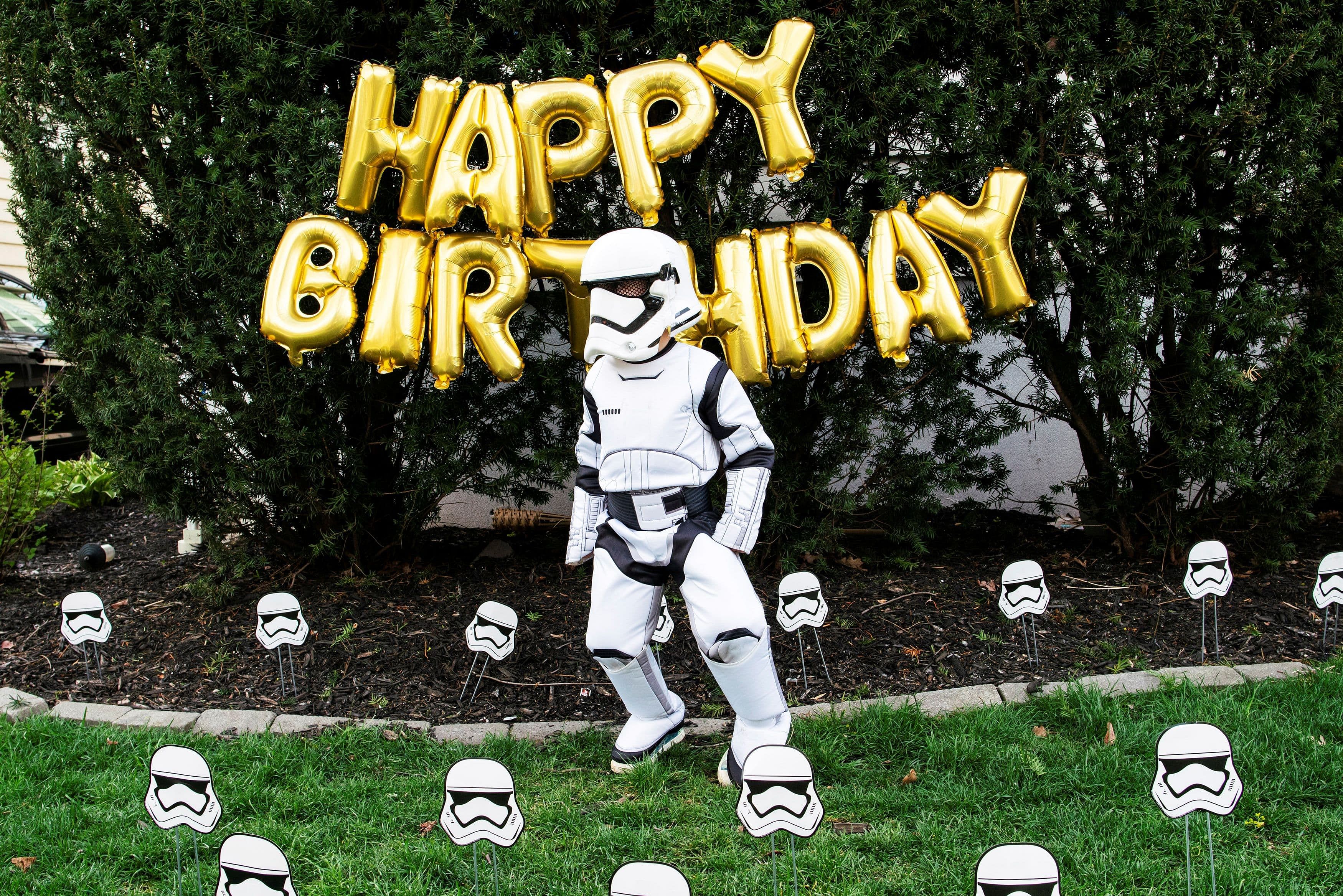 Reuben Goodman dressed as Star War Trooper dances outside of his house on his 5th birthday party during the outbreak of the coronavirus disease  (Credit: Reuters Photo)