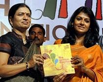 Actress Nandita Das, Chairperson of Children Film Society India, along with Andhra Pradesh Minister for Information and Public Relations D. K. Aruna showing a brochure after during a press conference to announce the details of the 17th International Childrens Film Festival, in Hyderabad on Saturday. PTI