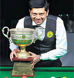Cup Of Joy: IH Manudev after winning the State-ranking snooker championship in Bangalore on Friday. DH Photo