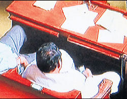 Ministers (now former) watching porn inside the Assembly.