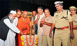 Integration: Sir Khazi of Mysore Mohammed Usman Shariff, bishop Thomas Antony Vazhapilly and seer Somanatha Swamiji together light the lamp, at the harmony meeting in Mysore on Saturday. MLAs H&#8200;S&#8200;Shankarlinge Gowda and Tanveer&#8200;Sait, chairman of Karnataka Exhibition Authority&#8200;B&#8200;P&#8200;Manjunath, police commissioner K&#8200;L&#8200;Sudheer and SP&#8200;R&#8200;Dileep are seen. DH Photo