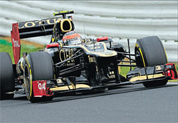 rookie error: Romain Grosjean, driving a Lotus, caused a costly mistake  at the Belgian Grand Prix last month, ending the race of two title contenders. AFP