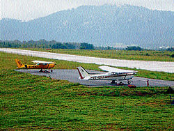 Aircrafts Cessna 152 (yellow) for Maharaja and Cessna 172 (white) for Yuvaraja paused flights are stationed at Mysore Airport on Saturday pertaining to unsupportive weather.