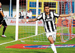 on target: Juventus Arturo Vidal celebrates after scoring against Catania. reuters