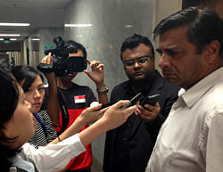 Indian High Commissioner to Singapore T.C.A. Raghavan (R) speaks to journalists about the condition of an Indian rape victim, who was flown to the country on Wednesday by the Indian government, outside the ICU ward of Mount Elizabeth Hospital in Singapore December 29, 2012. The condition of the 23-year-old Indian medical student whose gang rape triggered mass protests has deteriorated and there are signs her vital organs have failed, the hospital treating her said.  REUTERS