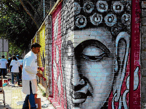 Spiritual hues Artists painted the walls on different themes.