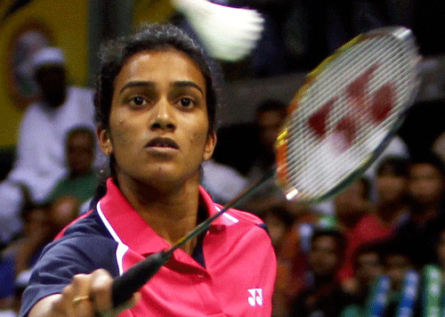 P V Sindhu in action against Thailand's Ratchanok Intanon during their Semifinal match at Yonex Sunrise India Open 2013 in New Delhi on Saturday. PTI Photo