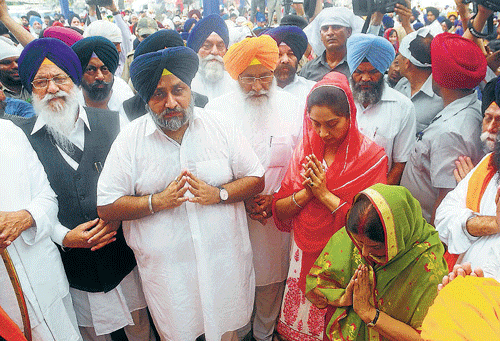 In remembrance: BJP leader Sushma Swaraj (in green) with Punjab Deputy Chief Minister Sukhbir Singh Badal at a ceremony to lay the foundation stone for the 1984 anti-Sikh riots memorial, at the Gurdwara Rakab Ganj Sahib Complex in New Delhi on Wednesday.  DH&#8200;Photo