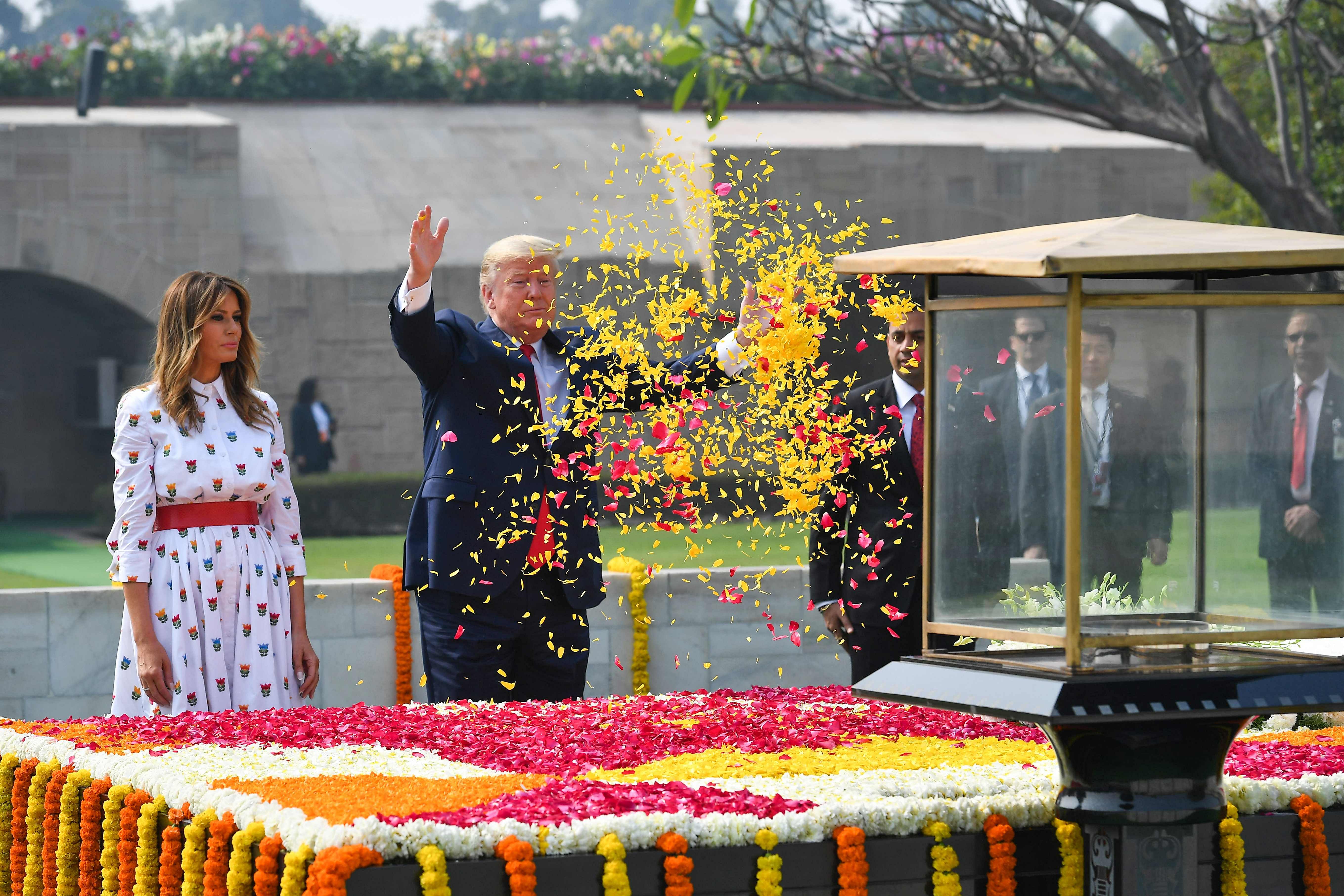 The Trumps reached Rajghat after a ceremonial reception at the Rashtrapati Bhavan. (Credit: AFP Photo)