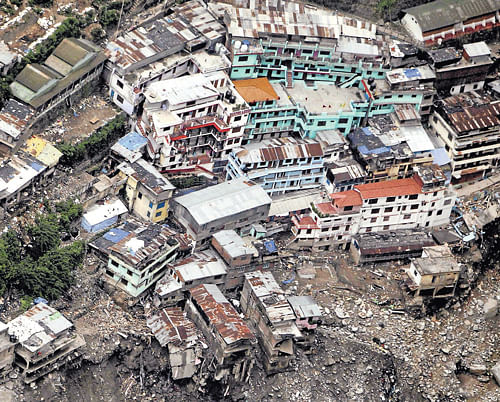 Devastation: A view of damaged houses after rains and flood in Srinagar, Uttarakhand, on Tuesday.  PTI