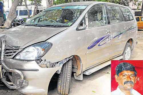 The car of S Manjunath (inset) that met with an accident on Hoskote Road on Monday night. DH Photo/ Ranju P