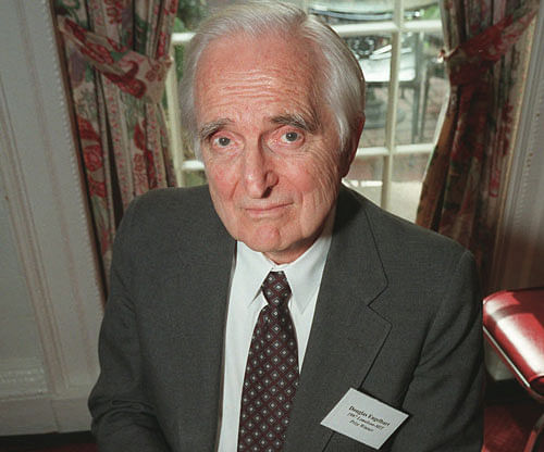 FILE - In this April 9, 1997 file photo, Doug Engelbart, inventor of the computer mouse and winner of the half-million dollar 1997 Lemelson-MIT prize, poses with the computer mouse he designed, in New York. Engelbart has died at the age of 88. The cause of death wasn't immediately known. AP Photo