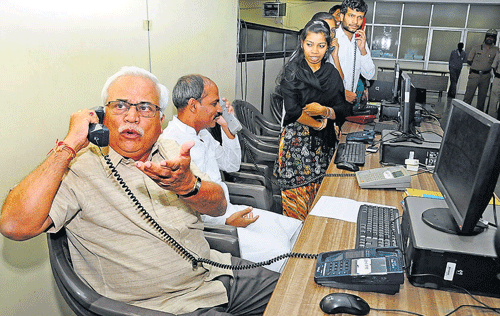 May i help you: Higher Education Minister R V Deshpande and Medical Education Minister Dr Sharan Prakash Patil inaugurate a helpline, set up for CET 2013, in Bangalore on Thursday.  dh photo