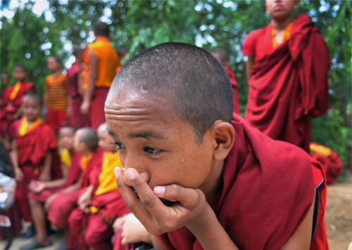 Novice Buddhist monks at Terger Monatery after the blasts in the Mahabodhi Temple campus at Bodhgaya on Sunday. Nine serial explosions today rocked the internationally renowned temple town of Bodh Gaya. PTI Photo