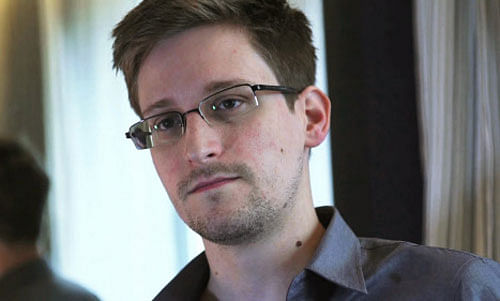 File photo of NSA whistleblower Edward Snowden, an analyst with a U.S. defence contractor, being interviewed by The Guardian in his hotel room in Hong Kong reuters