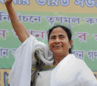 est Bengal Chief Minister Mamata Banerjee waves to her party supporters during an election campaign for Howrah Constituency, ahead of by-election in Howrah district, West Bengal on Friday. PTI
