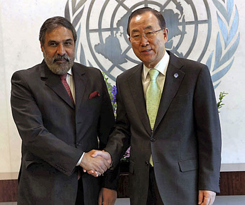UN Secretary-General Ban Ki-moon shakes hand with Anand Sharma, Union Minister for Commerce & Industry, at the UN Secretariat in New York on Wednesday. PTI Photo