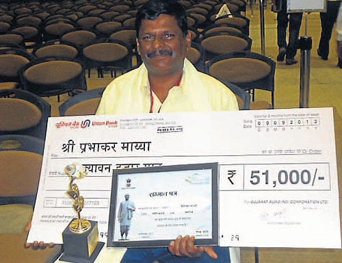 Prabhakar Mayya with the award.