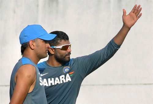 Indian Cricketer Captain M S Dhoni and R Jadeja during the practice session at VCA Stadium in Nagpur on Monday, ahead of the sixth ODI against Australia. PTI Photo