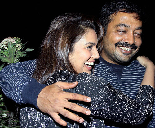 Bollywood actor Huma Qureshi with director Anurag Kashyap during the screening of film American Hustle in Mumbai on Saturday. PTI Photo