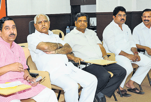 meet: BJP State president Pralhad Joshi, leaders B S Yeddyurappa, Jagadish Shettar,  R Ashoka Kumar and D V Sadananda Gowda at a meeting in Bangalore on Monday. dh photo