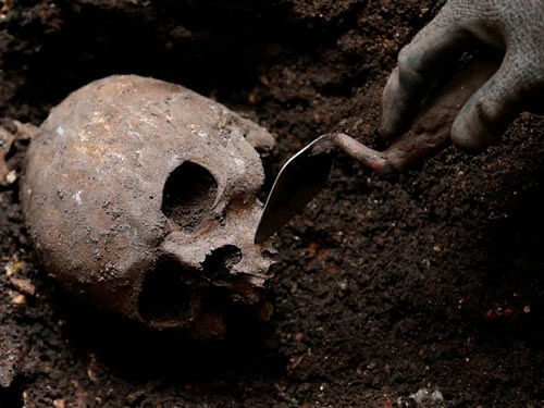 Workers digging a hole last week found 1,000 buried skeletons. Old documents revealed they'd disturbed the graveyard of an ancient lunatic asylum. Reuters photo for representation only