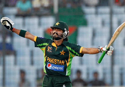 Pakistan's Fawad Alam celebrates after scoring a century against Sri Lanka during their 2014 Asia Cup final match in Dhaka March 8, 2014. REUTERS