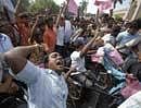Telengana Rashtra Samithi (TRS) members and supporters shout slogans during a protest in Hyderabad. demanding the split of the state in two for reasons of better governance and economic development (AP)