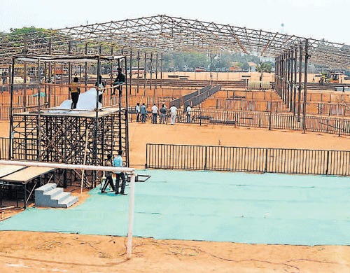 The stage and seating arrangements are being readied at Nehru Maidan in Mangalore,in view of Rahul Gandhi's visit scheduled on Friday. DH photo