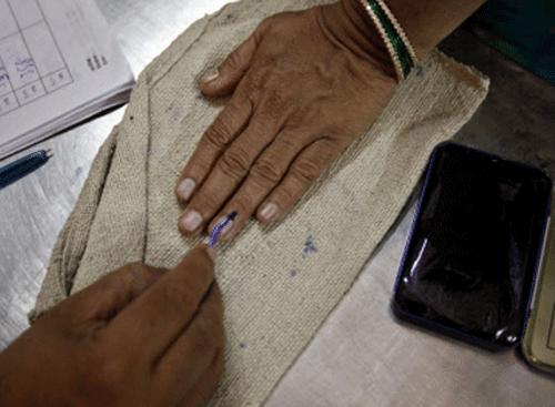 For the first time in years, indelible ink will be applied on the left thumb of voters during this Lok Sabha elections. AP File Photo. For Representation Purpose