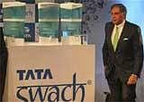Tata Group chairman Ratan Tata stands next to The Tata Swach water purifier during its launch in Mumbai, on Monday. AP