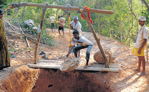 The work on a well is in progress in one of the villages in Dakshina Kannada. DH photo