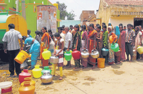 Water supplied through tankers is the only resort for people in many places during summer. DH FILE PHOTO