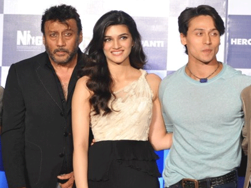Tiger Shroff's debut Bollywood film ''Heropanti'' released alongside ''Kochadaiiyaan'', featuring his father Jackie Shroff. But instead of being nervous about it, the young actor had a tongue-in-cheek retort. PTI File Photo.