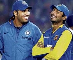 LEFT IS RIGHT, ISNT IT?: Yuvraj Singh and Kumar Sangakkara, southpaws both, had a great time in the T20 games between India and Sri Lanka. PTI