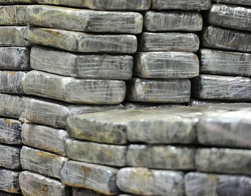 Fifty kilogrammes of heroin with a street value of about five million pounds was found woven into handmade rugs from Pakistan which had arrived at Manchester Airport, police said today. Reuters file photo. For representation purpose
