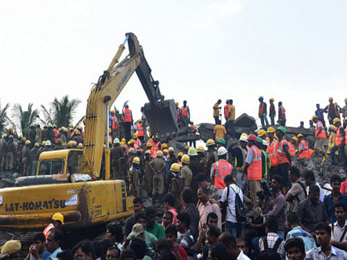 The death toll in the multi-storey building collapse in Moulivakkam near suburban Porur in Tamil Nadu rose to eleven on Sunday even as fire service personnel continue to search for workers feared trapped under the debris. PTI photo