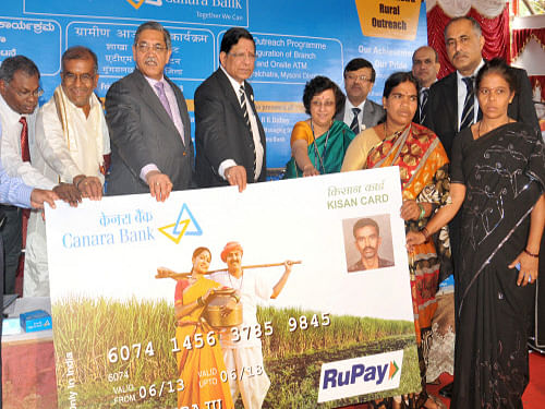 As many as 76 mega functions are being organised at different places to mark the launch of the scheme, under which the new account holders will be provided RuPay debit cards with an inbuilt insurance cover of Rs 1 lakh. DH file photo