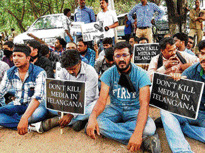 Journalists stage a dharna in front of Raj Bhavan for the second day protesting the gagging of media by the government.