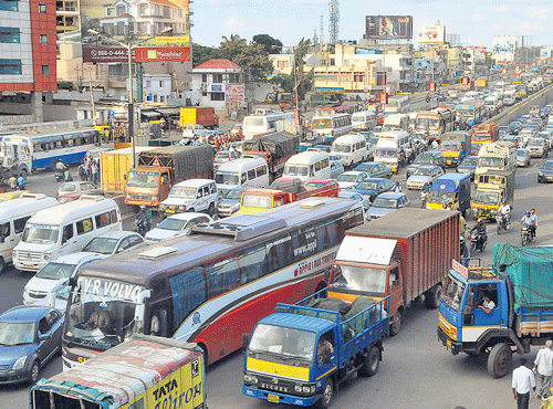 Chaotic: Traffic jams are a common occurrence near KR Puram railway station. DH PHOTO