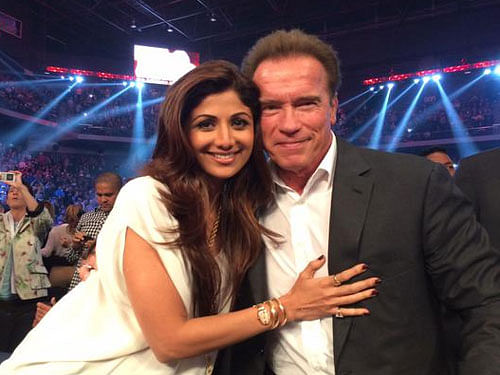 Bollywood actress Shilpa Shetty met Hollywood action star Arnold Schwarzenegger at a boxing match in Macau, China. Image Courtesy: Twitter
