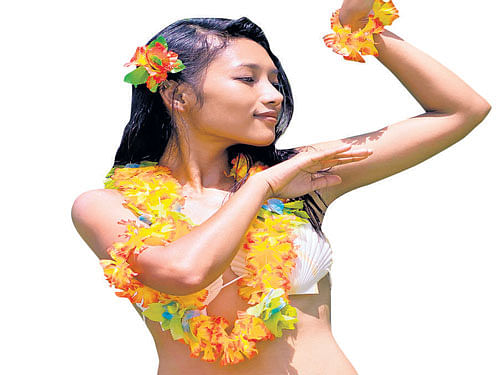 A soft move A Hawaiian woman dancing the Hula.