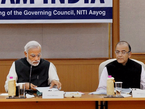 Prime Minister Narendra Modi with Union Finance Minister Arun Jaitley and NITI Aayog Vice-Chairman, Arvind Panagariya during the first meeting of Governing Council of NITI Aayog in New Delhi on Sunday. PTI Photo