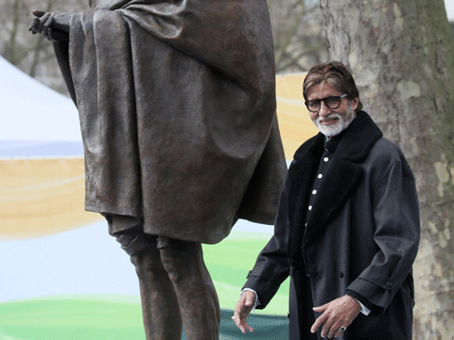 Indian actor Amitabh Bachchan poses for a photograph after the unveiling of a statue of Mahatma Ghandi in parliament square, London. AP Photo