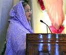 Bangladesh Prime Minister Sheikh Hasina delivers her speech after receiving the Indira Gandhi Award in New Delhi on Tuesday. AFP